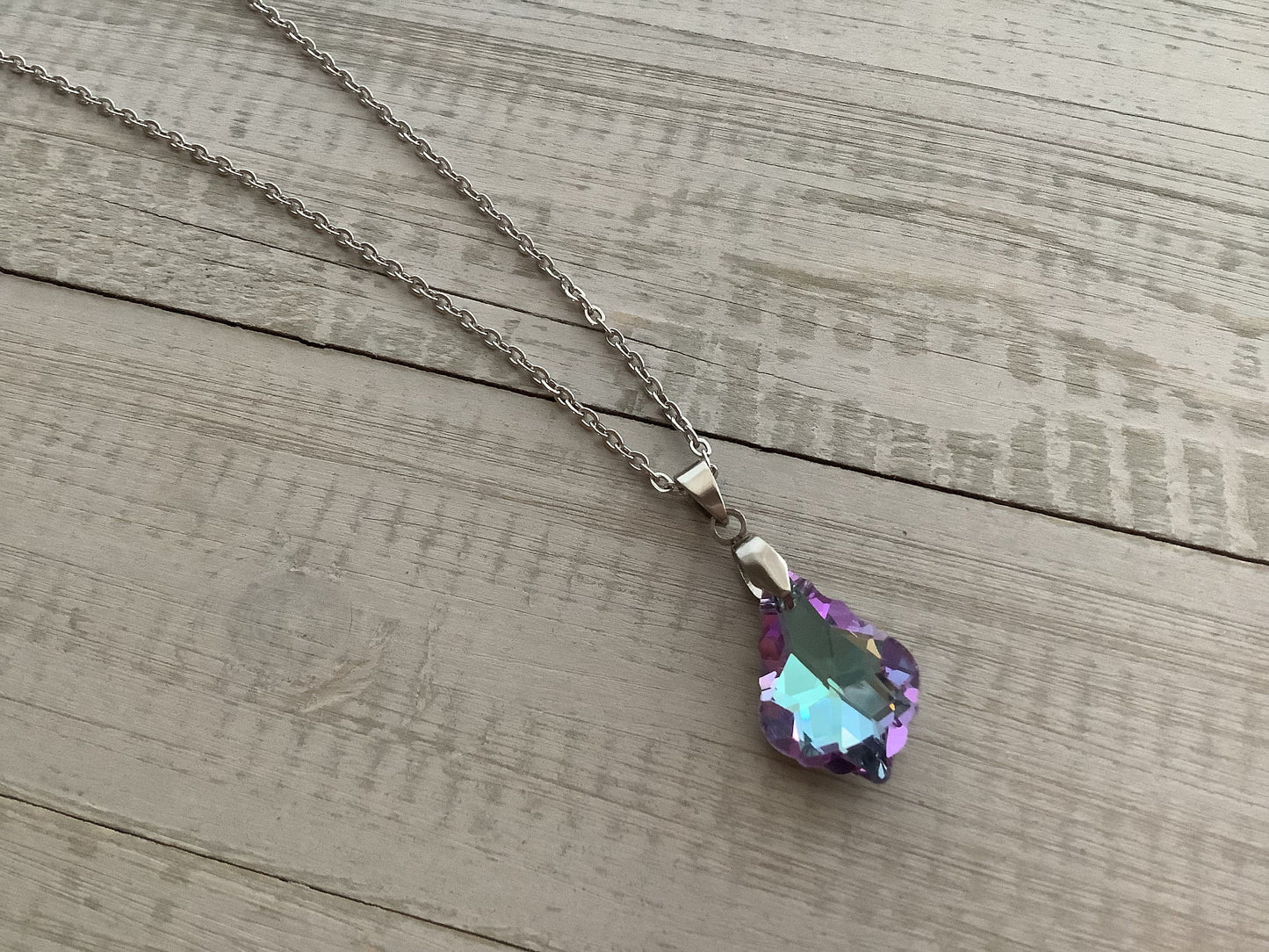 Crystal pendant necklace with stainless steel chain, mystical colors, purple pink teal