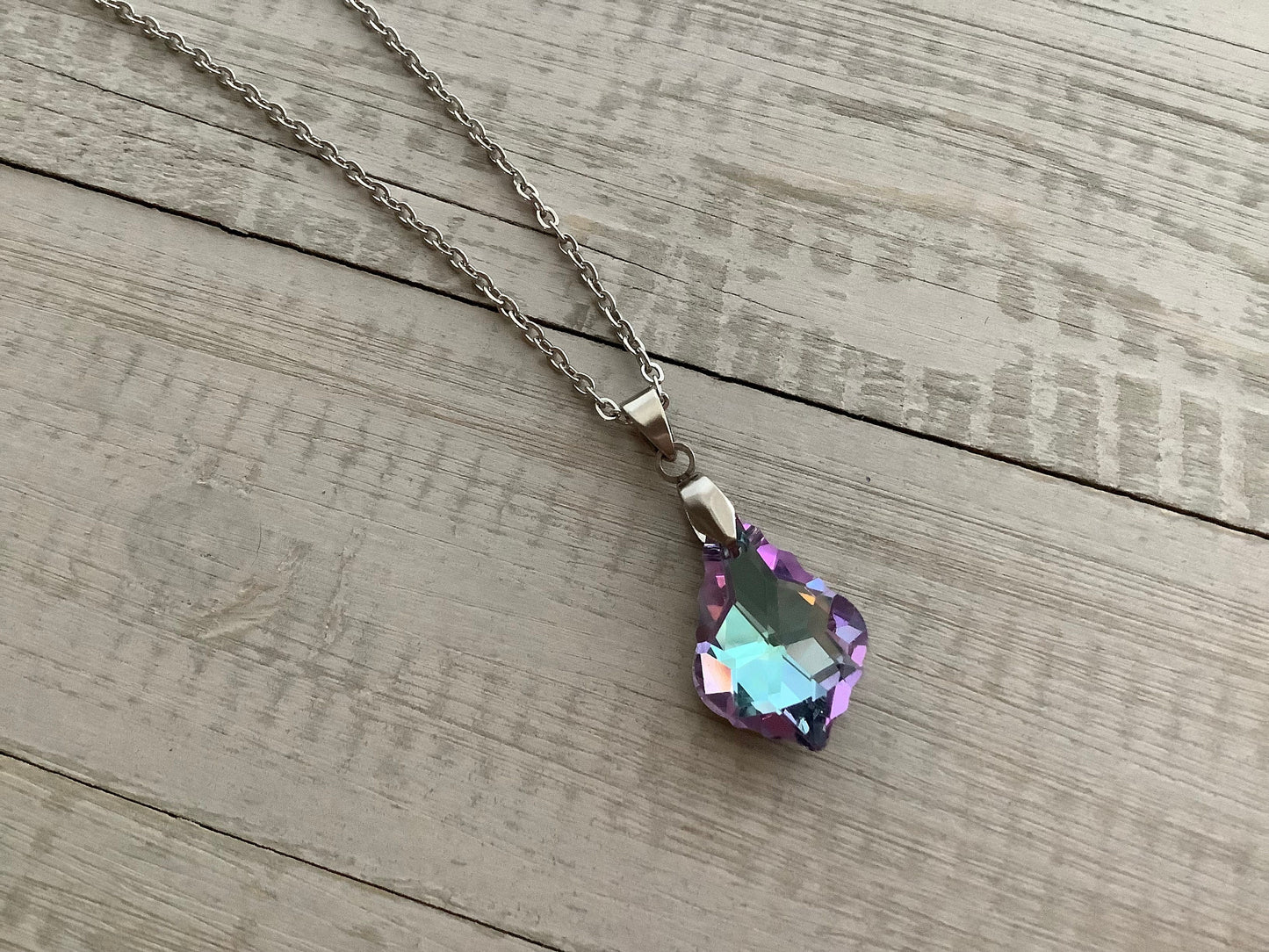 Crystal pendant necklace with stainless steel chain, mystical colors, purple pink teal