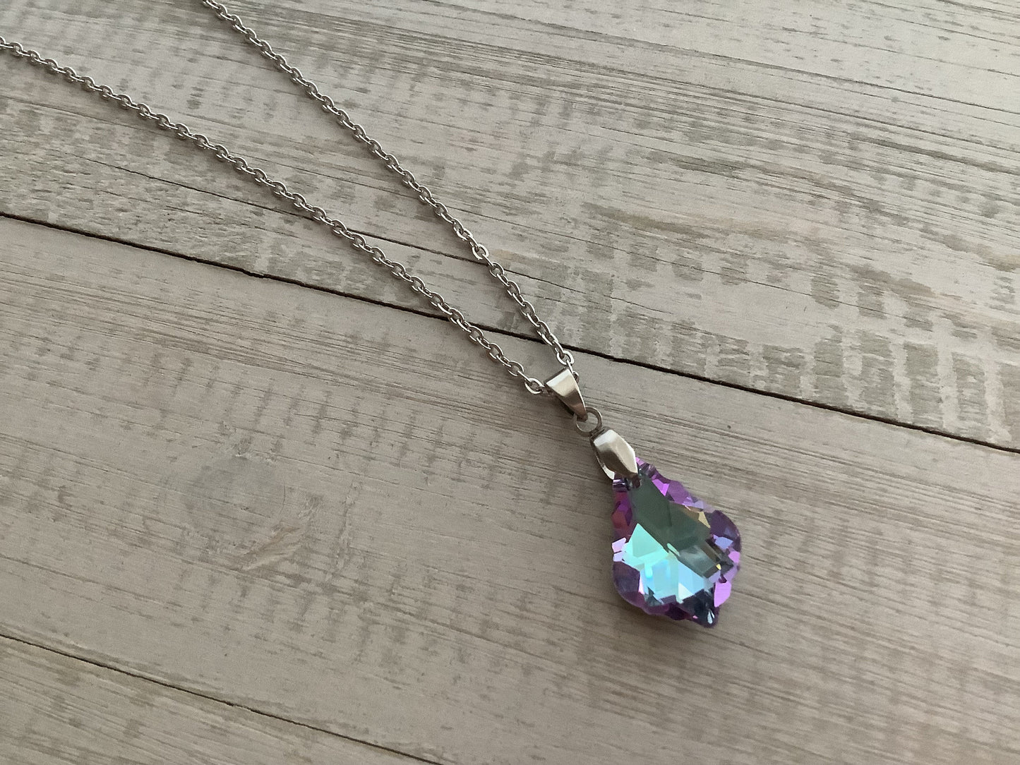 Crystal pendant necklace with stainless steel chain, mystical colors, purple pink teal